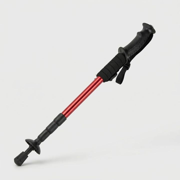 Compact 4-section folding trekking pole, shown ready for use, perfect ultralight outdoor gear.