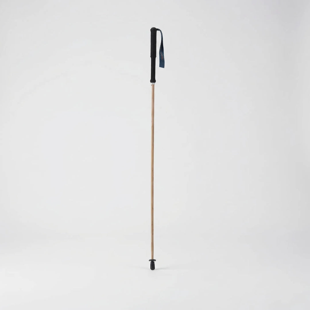 Durable & lightweight unisex folding hiking pole, designed for comfort and stability on diverse outdoor terrains.