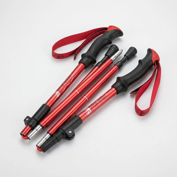 Unisex adjustable folding trekking poles, ultralight for nordic walking & hiking adventures. Essential outdoor gear.
