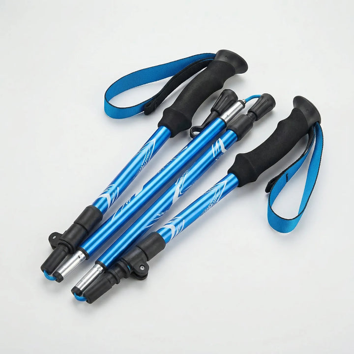 Easy-fold adjustable ultralight trekking poles, perfect for hiking, trail walking & compact travel. Durable outdoor gear.