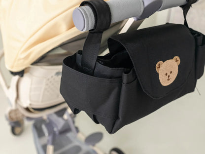 Durable stroller organizer featuring a sweet panda, ideal for bottles and baby essentials