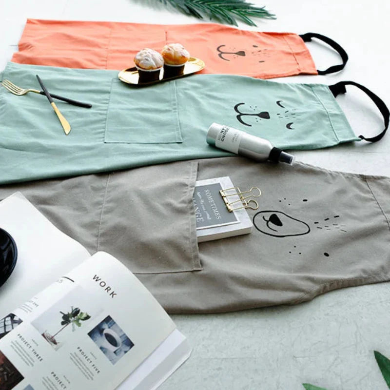 Kids' crafting apron with a cute bear design, protecting clothes during creative sessions.