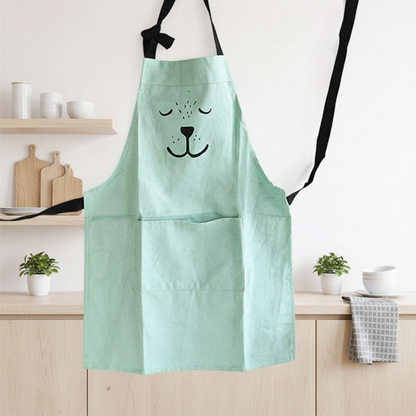 Adjustable neck strap detail on a unisex fun bear apron, comfortable for all ages.