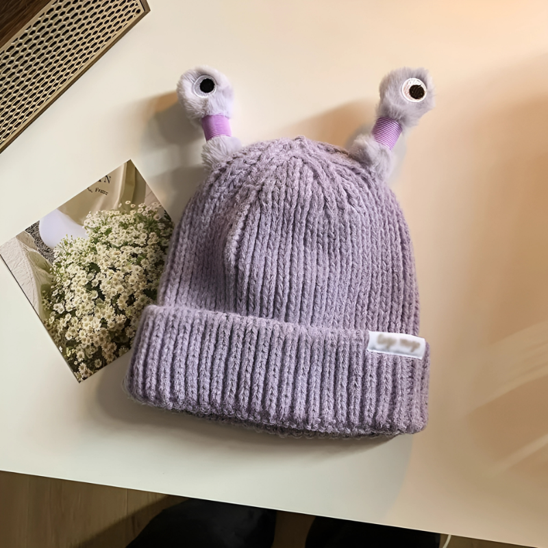 Detail of the glowing material on the Fun Monster Knit Hat, highlighting its unique feature