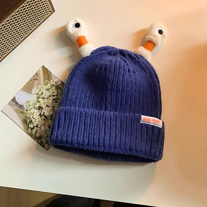 Teenager wearing a Fun Monster Glowing Knit Hat, stylish and warm for winter adventures