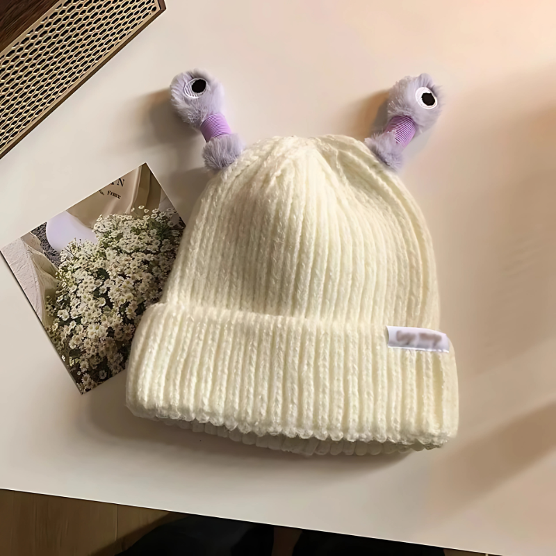 Kids wearing a Fun Monster Glow Knit Hat, smiling, demonstrating cozy and warm winter fashion