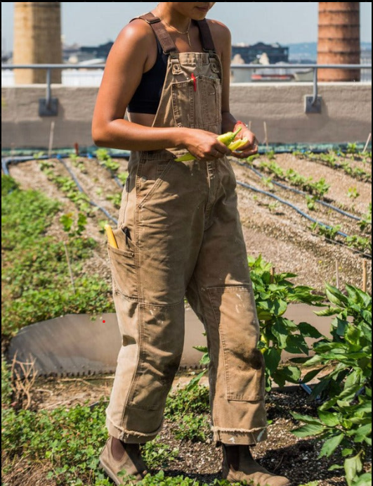 Unisex garden overalls with multiple utility pockets for tools. Durable & comfortable gardening workwear.