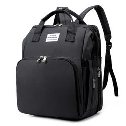 Unisex baby bag, full view, showcasing anti-theft back pocket and padded shoulder straps