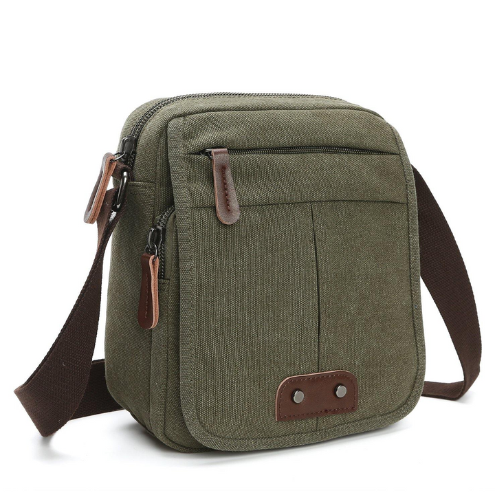 Unisex green canvas crossbody bag with multiple pockets & adjustable strap for organized everyday essentials.