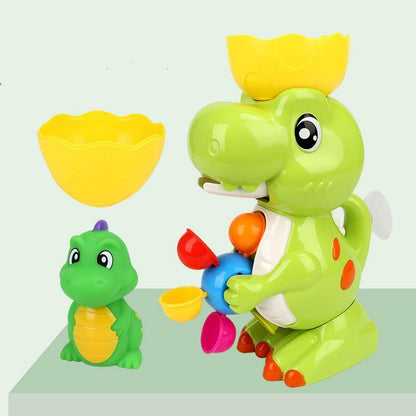 Close-up of a smiling dinosaur water spray toy, perfect for unisex baby bath time