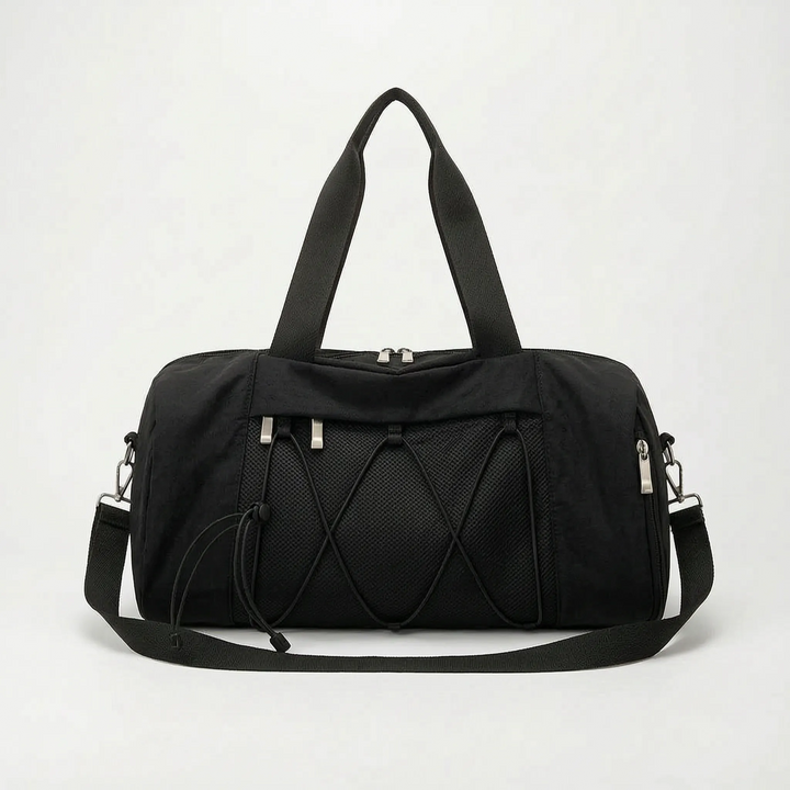 Versatile gym & travel duffel bag with adjustable shoulder strap & sturdy handles for easy carrying.