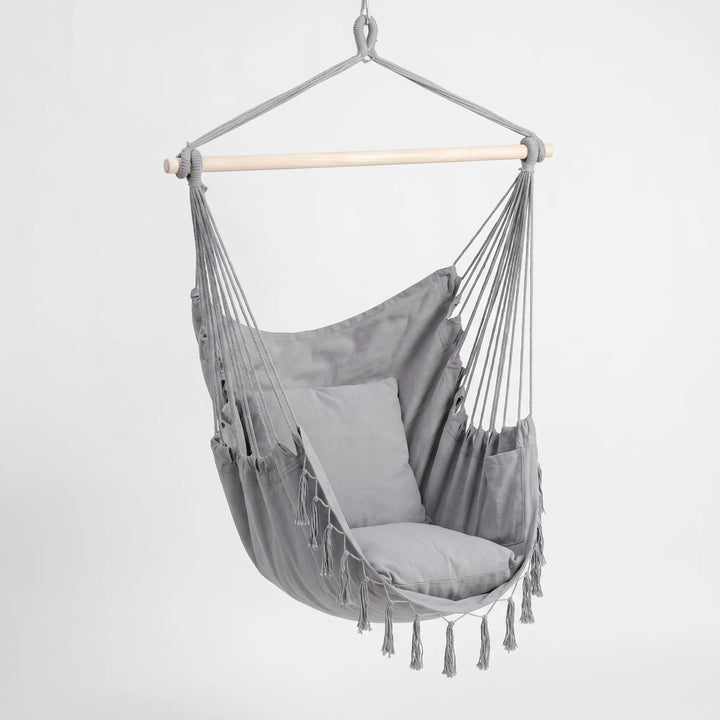 Bohemian canvas hammock chair swing, providing a cozy and stylish hanging seat for any relaxation spot.