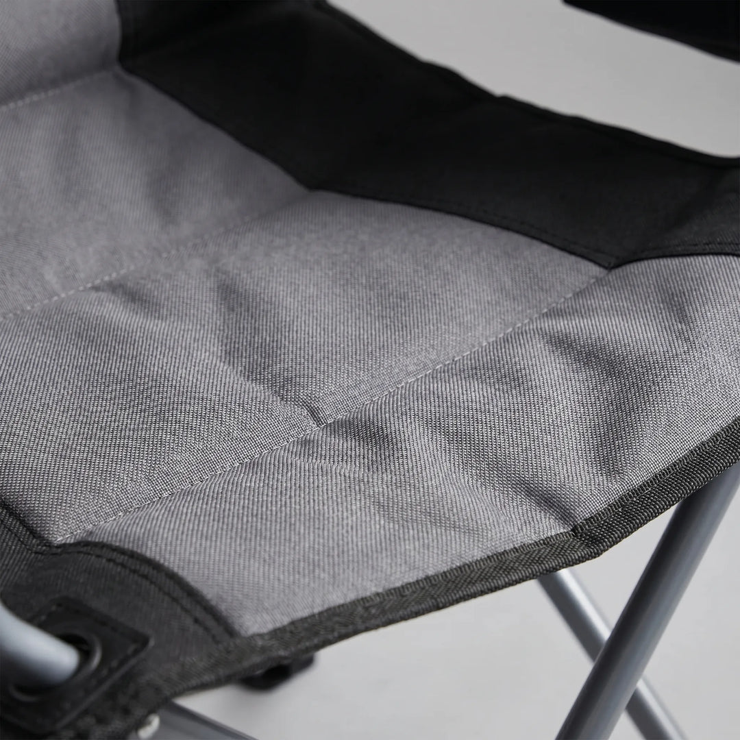 Portable heavy-duty folding chair, ideal outdoor seating for camping, picnics, fishing, and travel convenience.