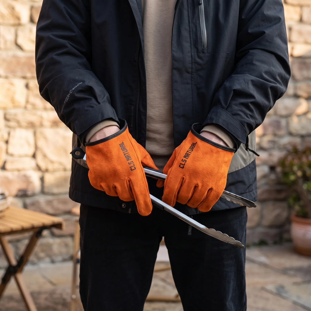 Unisex heavy-duty heat-resistant grill gloves for BBQ, outdoor cooking, and fire pit handling. Enhanced protection.