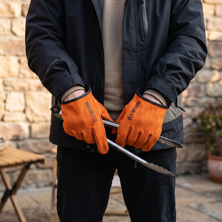 Unisex heavy-duty heat-resistant grill gloves for BBQ, outdoor cooking, and fire pit handling. Enhanced protection.