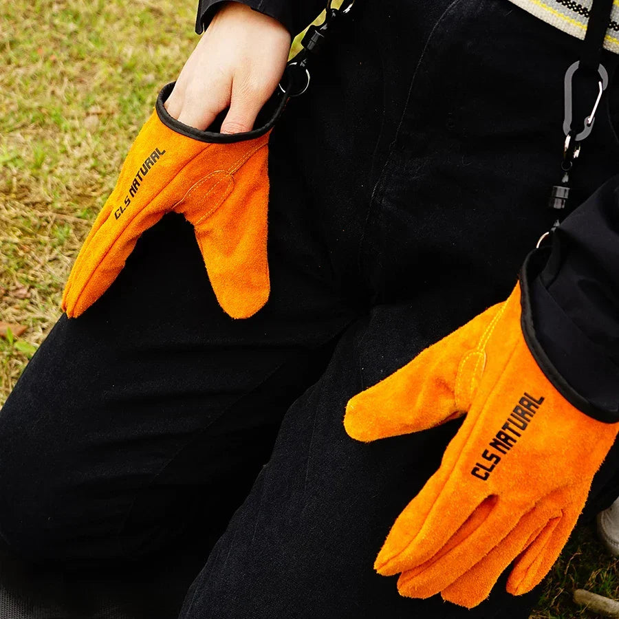 Protective heavy-duty heat-resistant gloves for fire pit use, camping, and outdoor cooking tasks. Extreme heat safety.