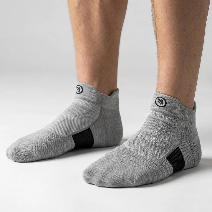Breathable unisex compression running tube socks, cushioned for endurance & comfort on trails.
