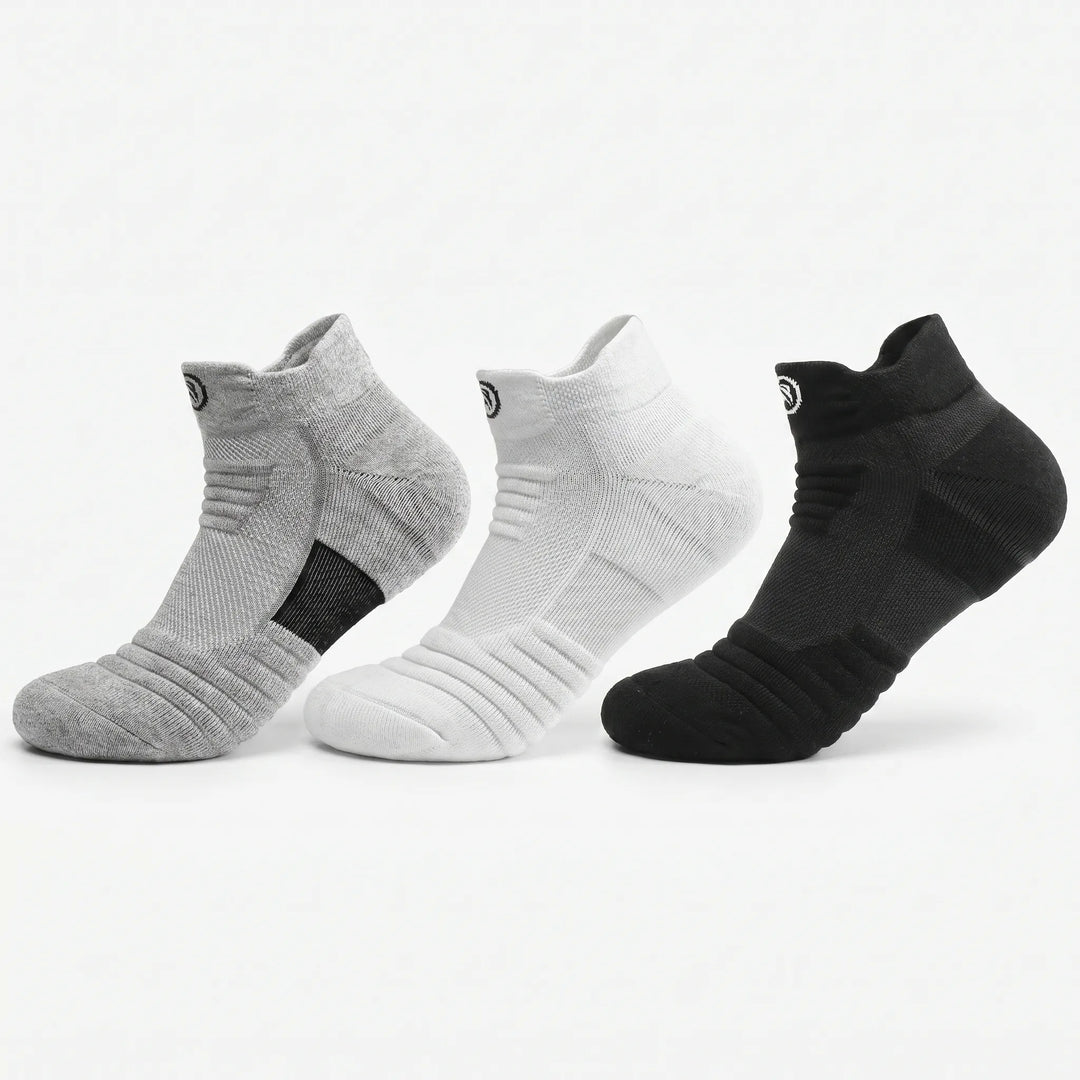 Cushioned unisex basketball compression tube socks for court performance, grip & ankle support.