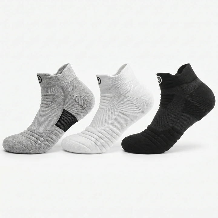 Cushioned unisex basketball compression tube socks for court performance, grip & ankle support.