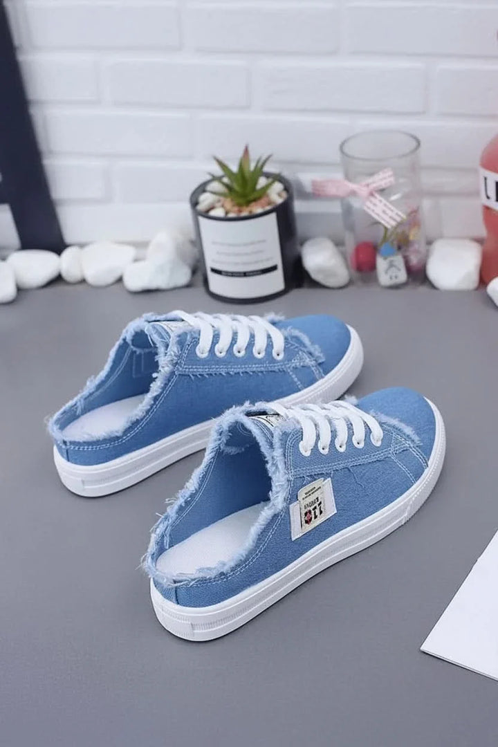 Unisex high-top lace-up sneakers in white, perfect for everyday casual style and comfort. Streetwear footwear.