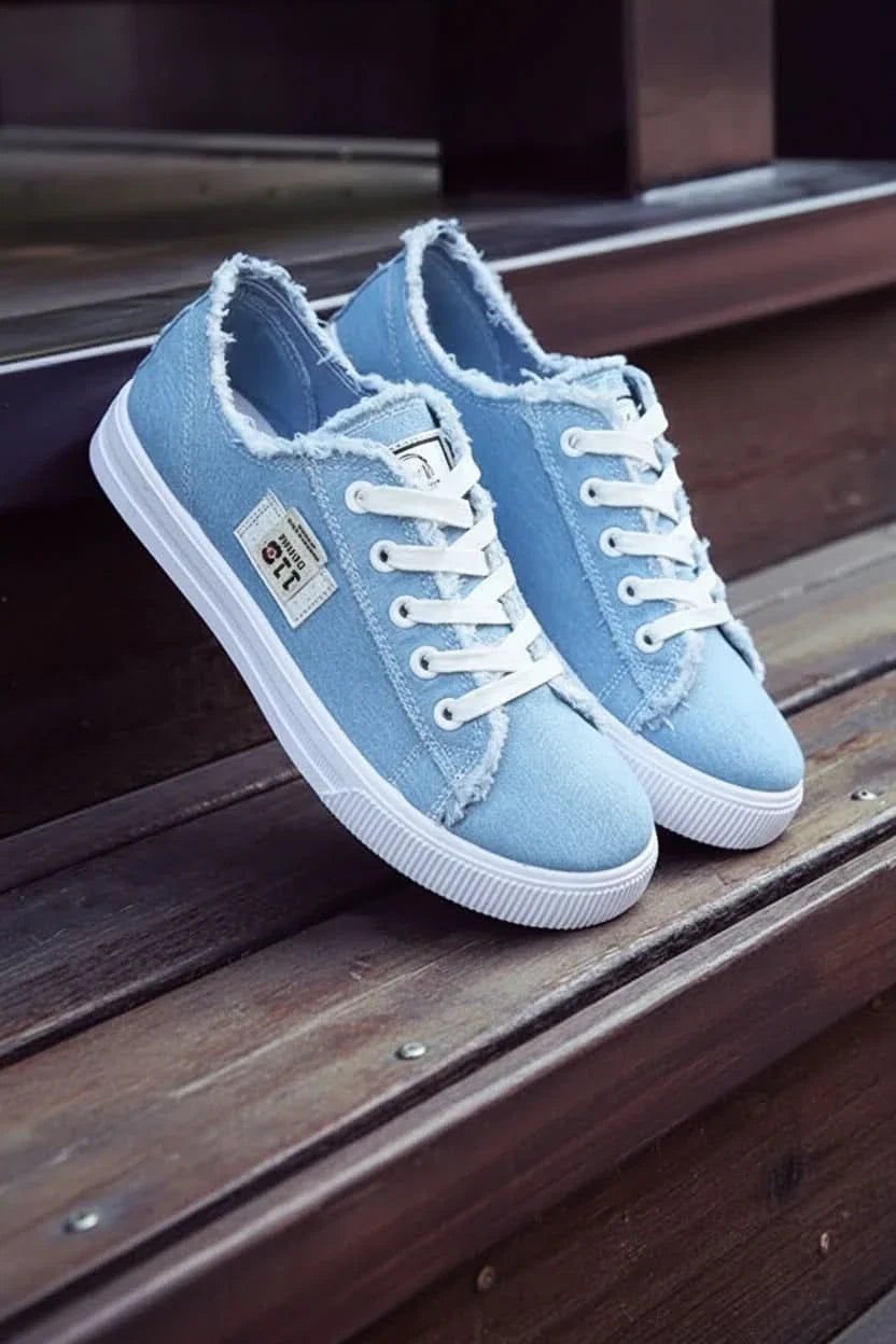 Pair of versatile unisex high-top lace-up sneakers, offering timeless style and all-day comfort for any outfit.