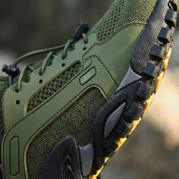 Rugged unisex high-top hiking shoes with quick-dry design, perfect for challenging outdoor adventures.