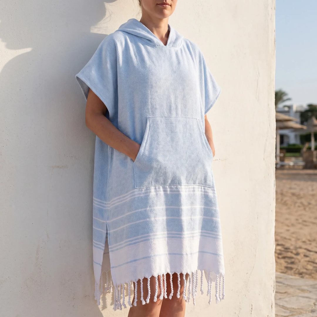 Unisex hooded changing towel poncho, quick-dry, perfect for beach, pool, or surf.
