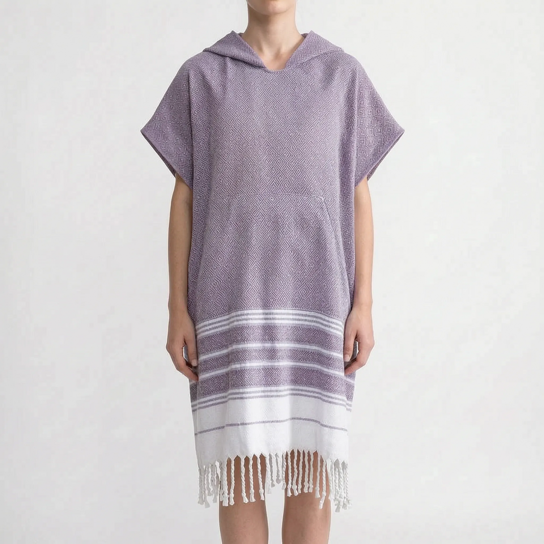 Easy-to-use unisex hooded changing poncho. Essential quick-dry beachwear for post-swim privacy.