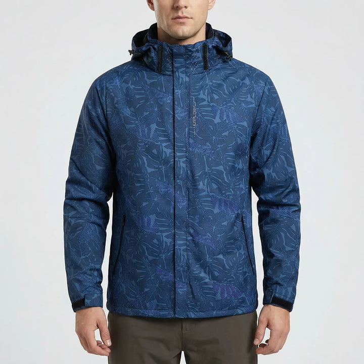 Detailed view of the vibrant botanical print and full-zip design on a unisex hooded windbreaker jacket.