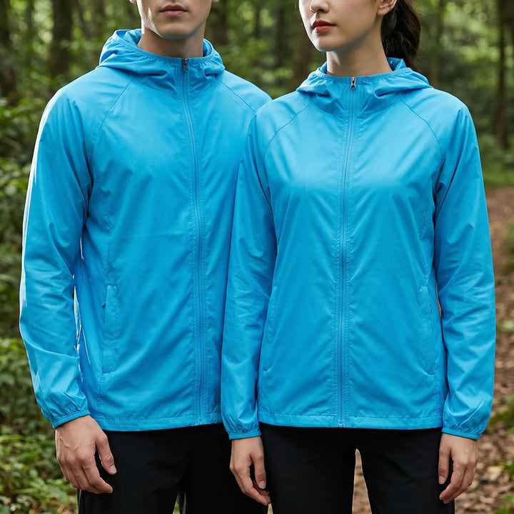 Packable hooded windbreaker jacket, unisex, excellent for lightweight travel and outdoor trips.