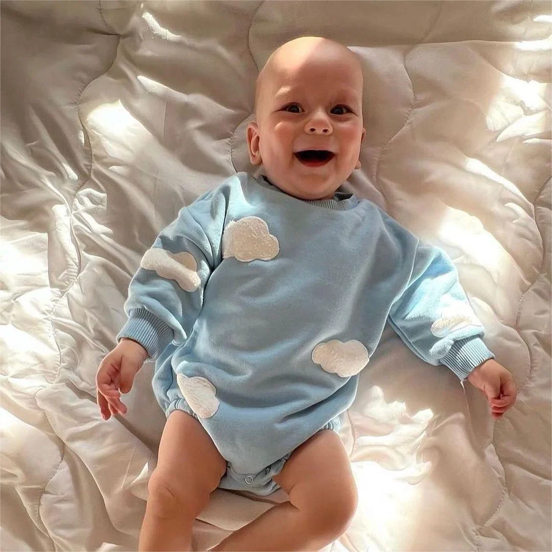 Adorable newborn cloud print jumpsuit, a must-have cotton baby outfit for gifting.