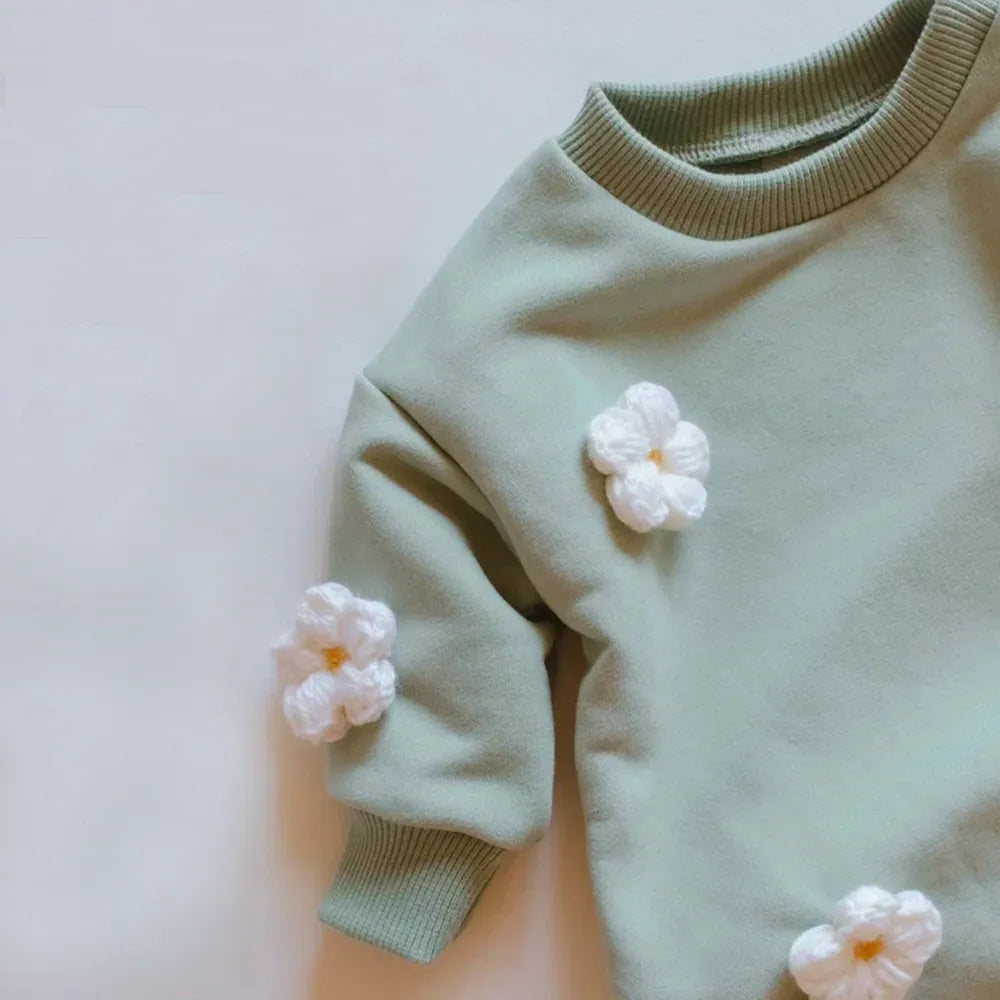 Full-length view of baby's cotton cloud print jumpsuit, showcasing its complete design.