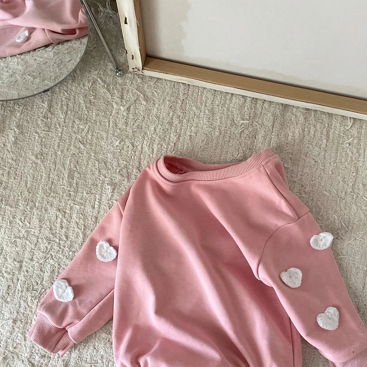 Playful cotton cloud print jumpsuit, ideal infant clothing for everyday adventures.