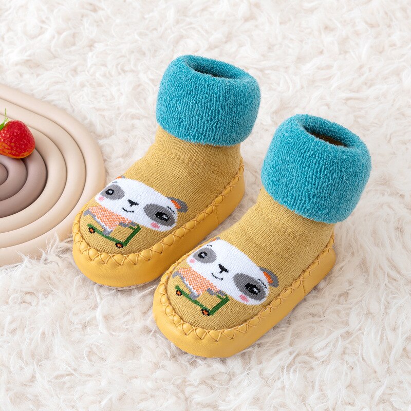 Side view of infant color-matching soft canvas walking shoes, promoting healthy foot development.