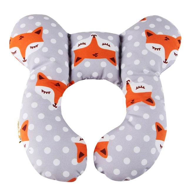 Neutral colored baby head support pillow with an anti-flat head design, comfortable cotton material, a useful crib accessory.