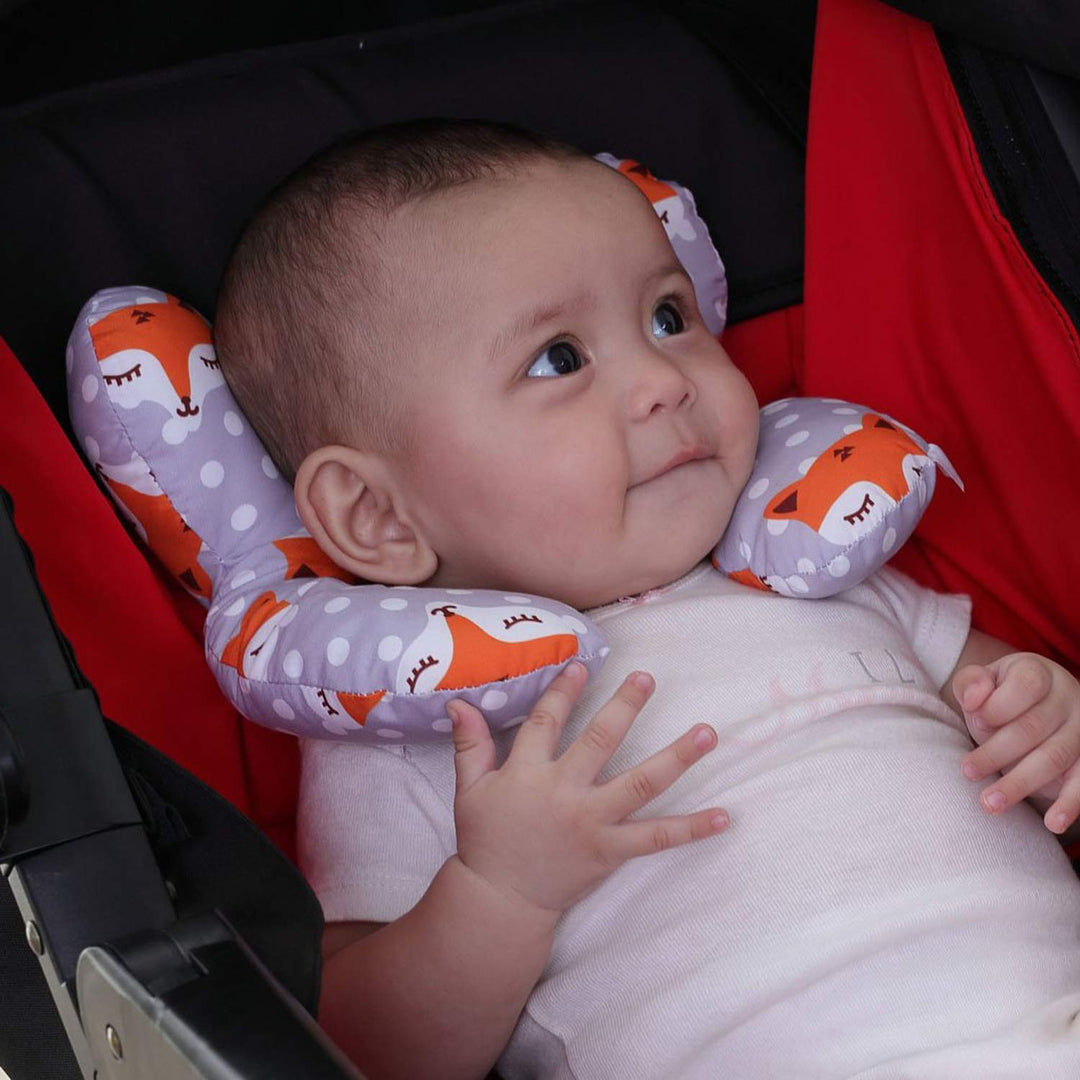 Infant head support pillow made from organic cotton, unisex design for babies, provides gentle support to prevent flat head.