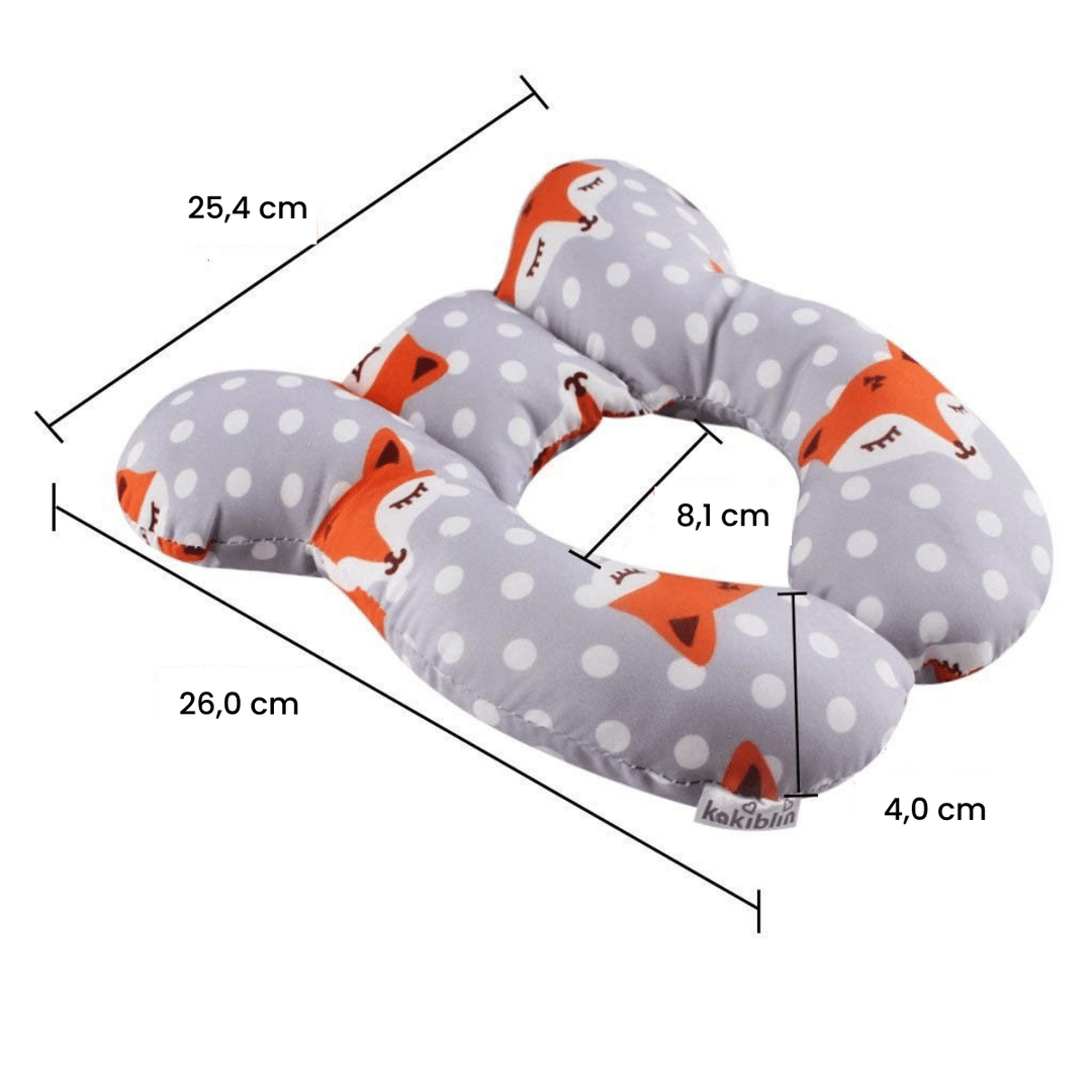 Newborn head support pillow featuring an ergonomic design to prevent flat head syndrome, an essential crib accessory.
