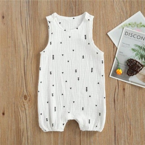 Unisex infant sleeveless cotton romper with buttons, perfect for summer.