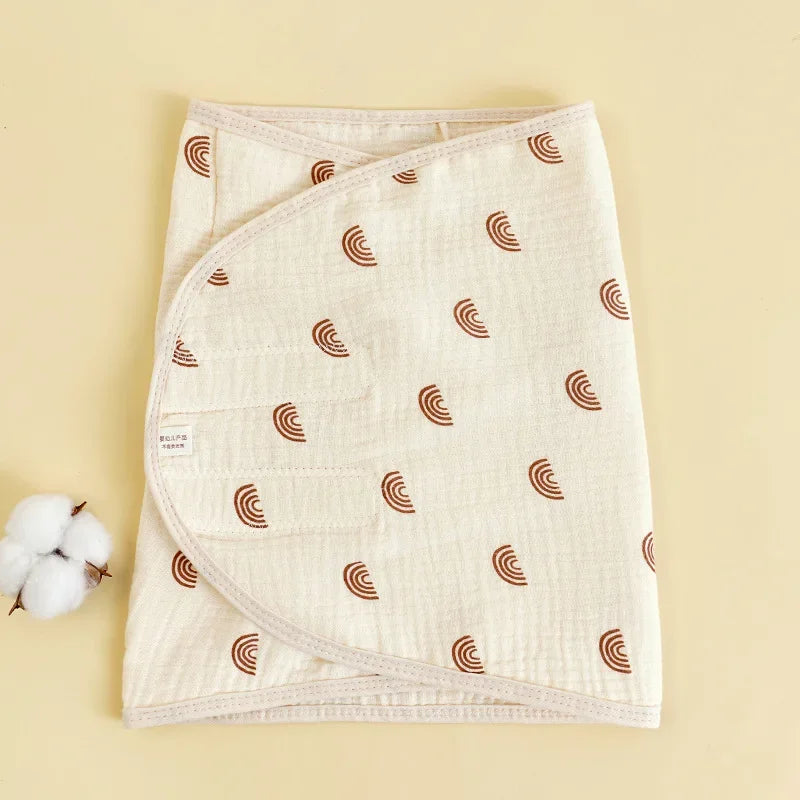 Unisex infant wrap with a playful cloud design, enhancing baby sleep and belly protection