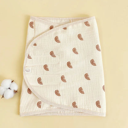 Unisex infant wrap with a playful cloud design, enhancing baby sleep and belly protection
