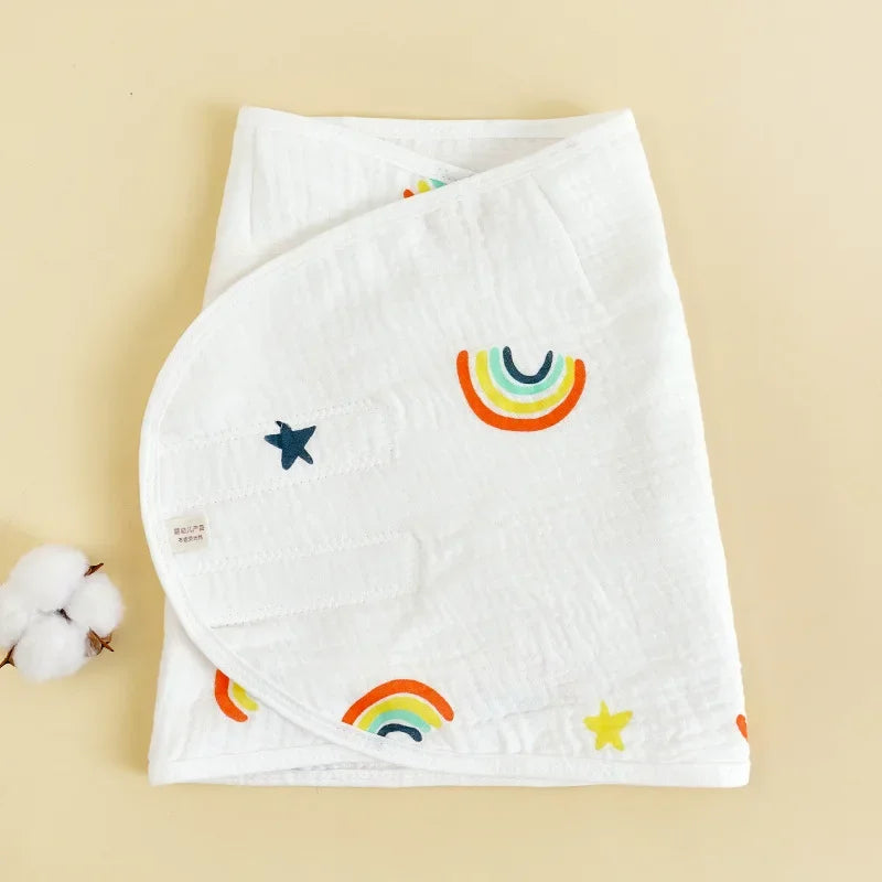 Baby swaddle blanket featuring a moon and stars design, a cozy newborn wrap for belly protection
