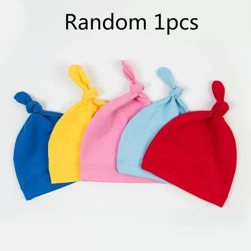 Open view of a folded unisex cotton swaddle, ready for belly protection and comfortable infant wrapping