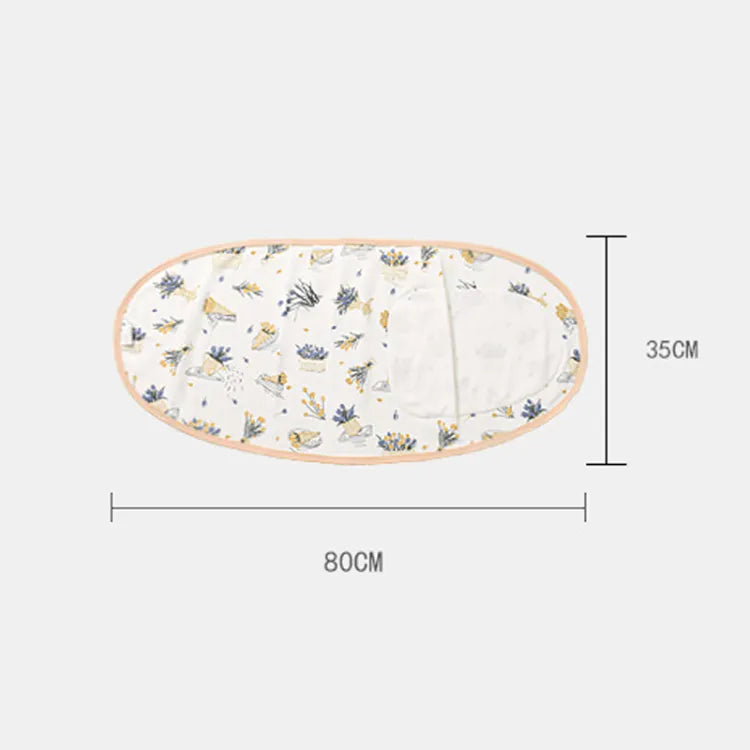 Newborn wrapped securely in a white cotton swaddle, ensuring belly protection during sleep