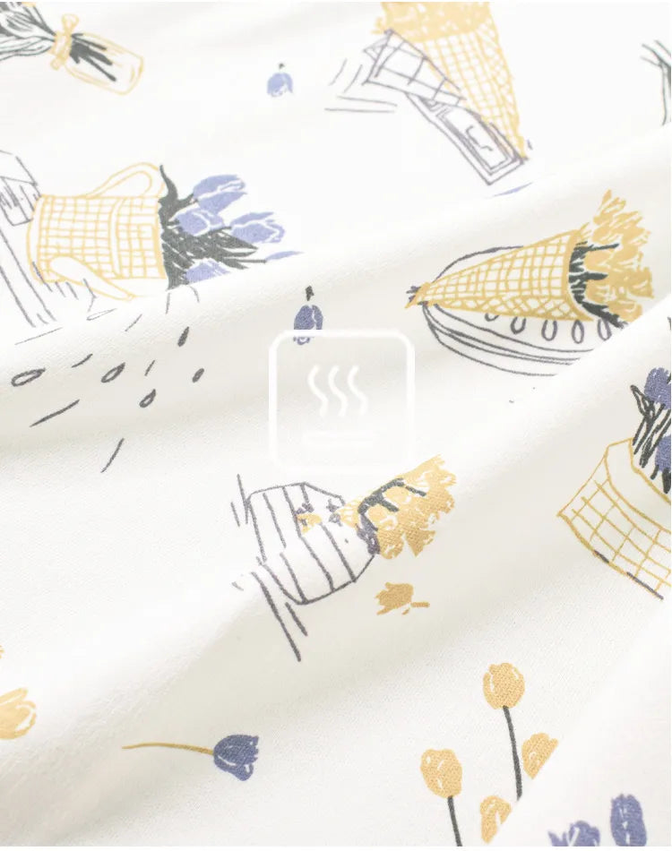 Soft cotton baby swaddle in a chevron pattern, designed for cozy baby sleep and belly protection