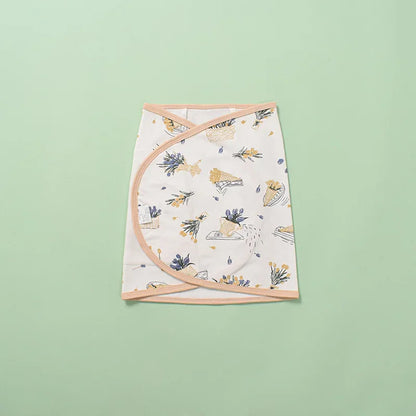 Soft green cotton swaddle blanket, offering comfort and crucial belly protection for newborns
