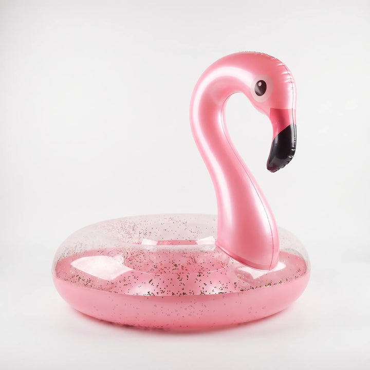 Durable pink flamingo pool float for outdoor play, a must-have summer accessory for relaxing in the water.