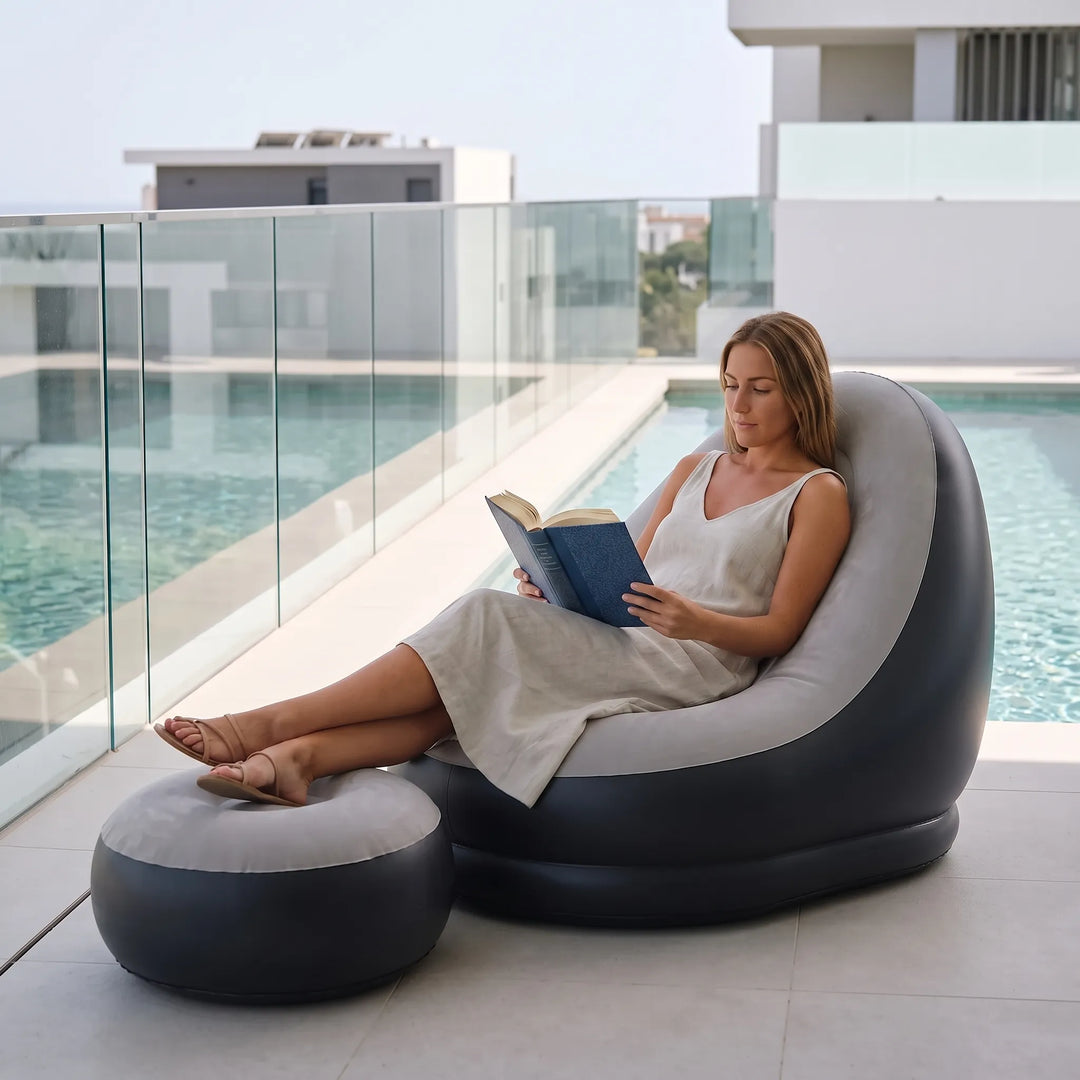 Unisex inflatable lounge chair with matching footrest ottoman for ultimate relaxation, ideal for indoor or outdoor use.