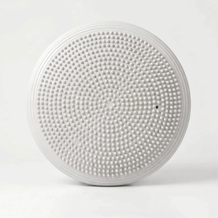 Unisex stability disc, an inflatable balance cushion ideal for fitness, yoga, and active sitting.