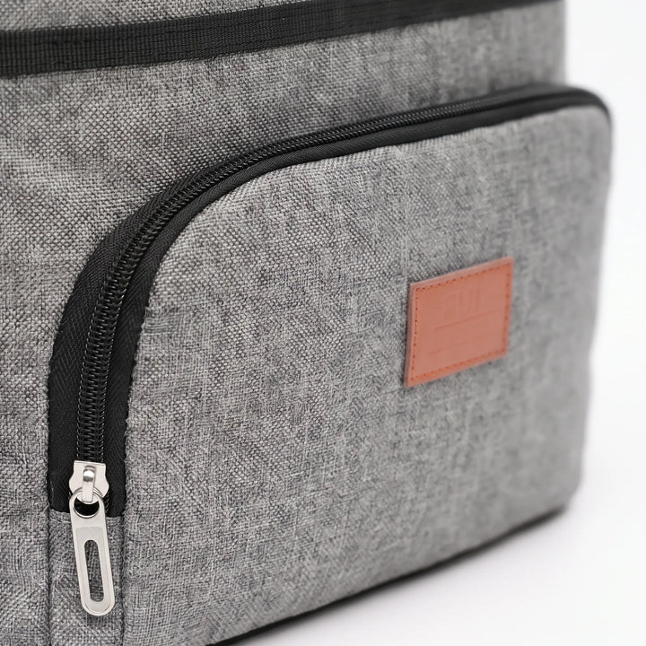 Unisex cooler bag ready for a picnic. Insulated lunch box keeps drinks & snacks cold for outdoor adventures & travel.