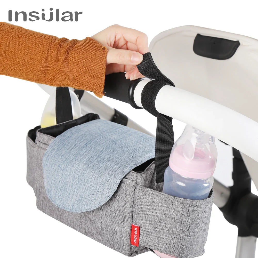 Unisex insulated diaper bag in gray, front view with milk bottle pockets visible, for baby travel.